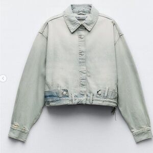 New TRF Denim Jacket With Paint Style Waist Light Blue Size XS.